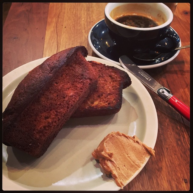 Banana bread with cinnamon butter and black coffee. I like this place.