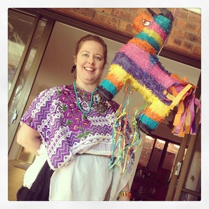 The birthday girl @knitdra with the piÃ±ata!