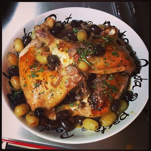 Dinner tonight: Smitten Kitchen's Harvest Roast Chicken with Grapes, Olives, and Rosemary. Very good!