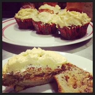 Prototyping for RSPCA Cupcake Day. I call it "The Elvis": banana cake with a peanut butter centre, topped with honey buttercream and a piece of candied bacon!