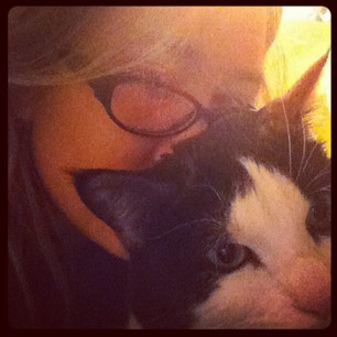 Wishing I could give hugs to all my family back home on this sad, cold night. The cat will have to do.