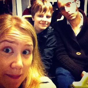 Three silly people on the bus to the city!