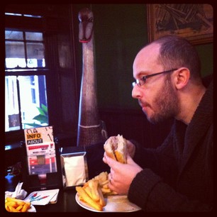 Mr Snook tries to ignore the giant wooden emu staring at his burger.