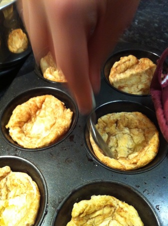 Pressing the cooked pastry back into place