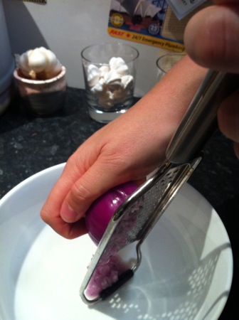 Grating red onion