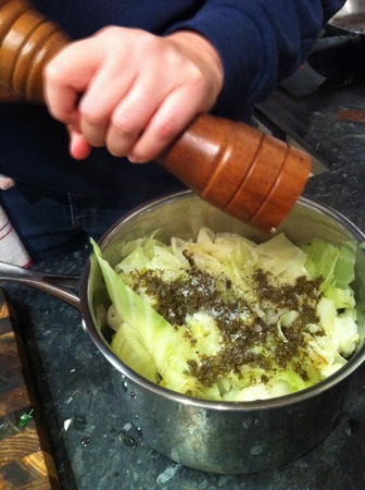 Adding mint sauce and seasoning