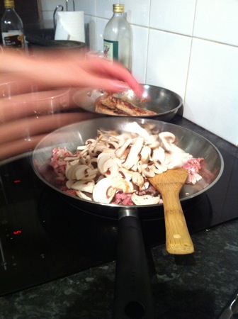 Adding the mushrooms