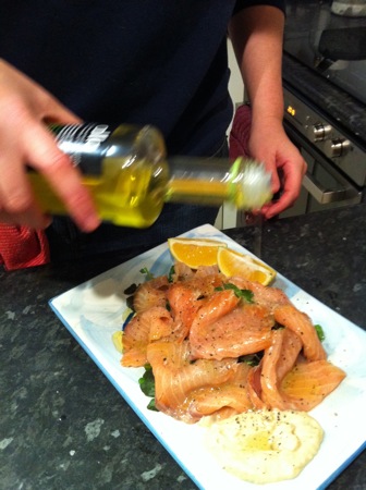 Adding lemon and olive oil