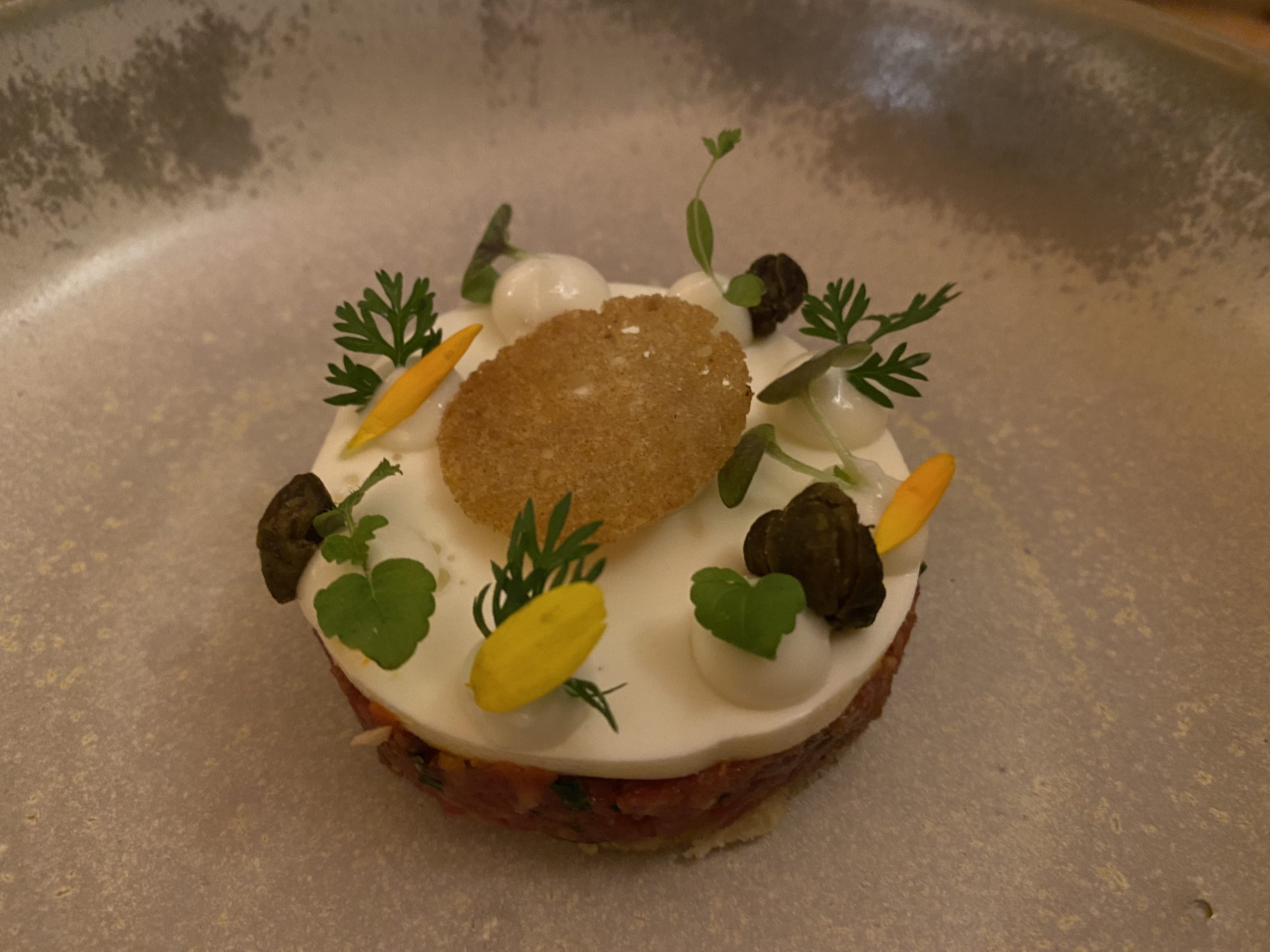Beef tartar with sour cream and chives