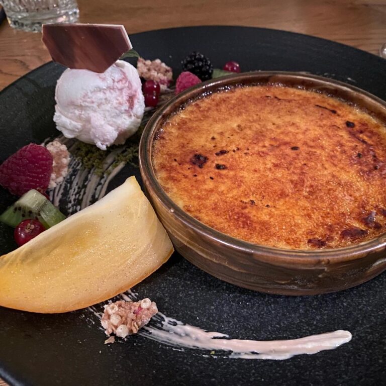 We treated ourselves to a fancy dinner at @koi_restaurant tonight! Dessert was ginger Crème Brûlée for me; chocolate fondant for the Snook. 😍