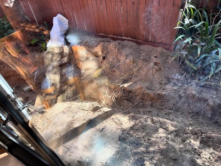 Progress update: The AC grills are on in the living room and bedroom! (Living room one needs the gaps at the sides filled, which will happen later.) Less attractive is the open trench alongside our house. Poor guy did it by hand so far and pulled out a lot of construction rubble. (Our neighbourhood is ex-industrial so it’s all backfill.) #renovation