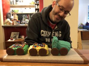 A happy boy and his choo-choo cake. Happy birthday Snookums! (Cake damn near defeated me. Icing *everywhere*.) 😅🚂🎂 https://t.co/xbY8SlFHLj