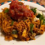 Listening to Christmas music while eating Tex-Mex Casserole, as one does...