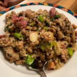 Hoppin’ John, a New Year’s tradition! Black-eyed peas, rice, ham hock, back bacon, onions, celery, jalapeño...