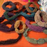 7 years ago I knitted the body of Orkney, an allover fairisle cardigan. I realised when I got to the shoulders that it was way too small, so I shoved it in a bag and went into deep denial. This week I finally frogged the whole thing, wound all 12 colours into skeins, gave them a bath, and hung them to dry. Tomorrow I’ll re-wind into balls and start afresh! 🧶