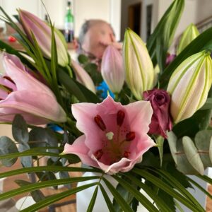 Mom sent me some lovely birthday flowers, but they do make it rather difficult to see my breakfast companion! 💐 (Thank you Susan Garberick!!)