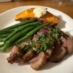 Picanha steak with homemade chimmichurri, green beans, and baked sweet potato. ❤️ He feeds us so well!