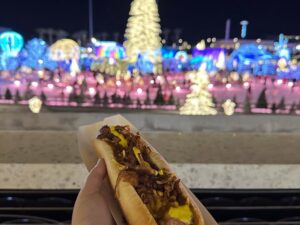 I finished my solo time in Las Vegas with a trip to @enchantlasvegas, a Christmas festival. The lights were pretty, but the playlist - Judy’s “Have Yourself a Merry Little Christmas” followed by the Peanuts Christmas song - had me literally crying at one point. I’m ready to go home. (A chilli dog helped.)