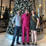 Our nephew @kurt_sss is visiting for the holidays so we caught up for a very beautiful Christmas Eve brunch at @woodcutrestaurant. We even had a visit from Santa! ❤️🎅🥂 (Outfits: mine is a @made590 Vera in @riflepaperco fabric; Kurt’s is the @barbie Double-Breasted Suit from @zara.)
