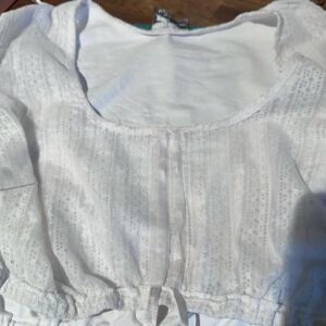 Very important and delicate mending complete! My lace dirndl blouse has a channel for a ribbon at the front so you can adjust the amount of décolletage you wish to display. However, mine was off-center and it always annoyed me. So today I *very carefully* unpicked the gauze, moved it, and reattached. It worked! #oktoberfestpreparation 🪡 🧵