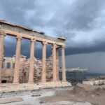 The Acropolis! We entered via the South entrance near the museum to avoid the crowds. I was particularly excited to see the Theatre of Dionysus. 🎭 As we finally neared the top, the sky began to look ominous. It made for some very dramatic shots of the architecture! I felt incredibly fortunate to get to see one of the greatest achievements of mankind. And then, of course, the heavens opened and we (along with everybody else) got soaked. 🌧️😂 Ah well…