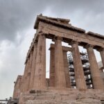 The Acropolis! We entered via the South entrance near the museum to avoid the crowds. I was particularly excited to see the Theatre of Dionysus. 🎭 As we finally neared the top, the sky began to look ominous. It made for some very dramatic shots of the architecture! I felt incredibly fortunate to get to see one of the greatest achievements of mankind. And then, of course, the heavens opened and we (along with everybody else) got soaked. 🌧️😂 Ah well…