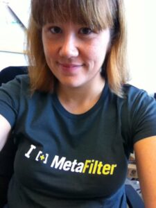 Snook SMSed me: "@mathowie sent you a package." Yay! MeFi T-shirt just in time for casual Friday.