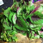 New veggie in the box tonight: amaranth. Treated it like spinach in scrambled eggs. Tasty and healthy!