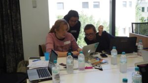 Action shot from SheHacks Saturday morning. Peggy Kuo and Maria Shvedova were trying to help me debug some particularly pernicious PHP!