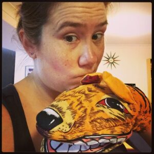 "I don't know, Tasmanian Tiger Oven Mitt, what do YOU think my favourite souvenir from the trip is?"