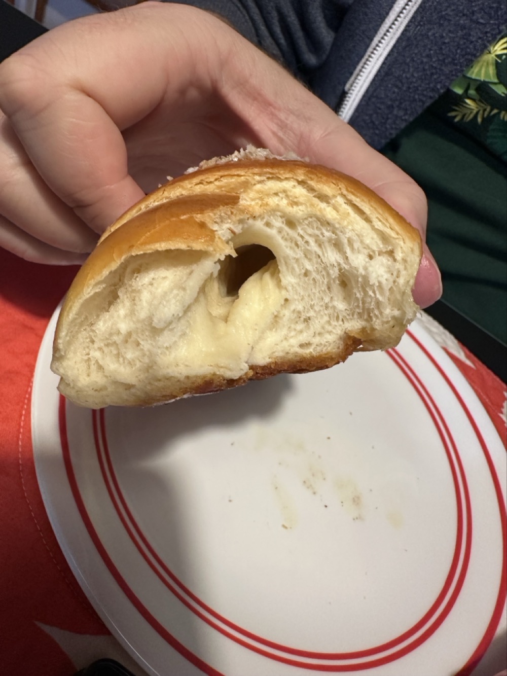 A view inside a salt bread, showing a hole where the butter melted