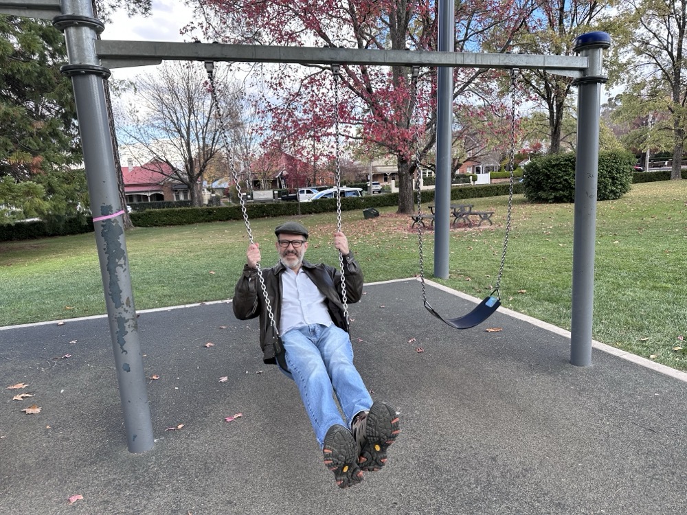 Rodd, swinging on a swing