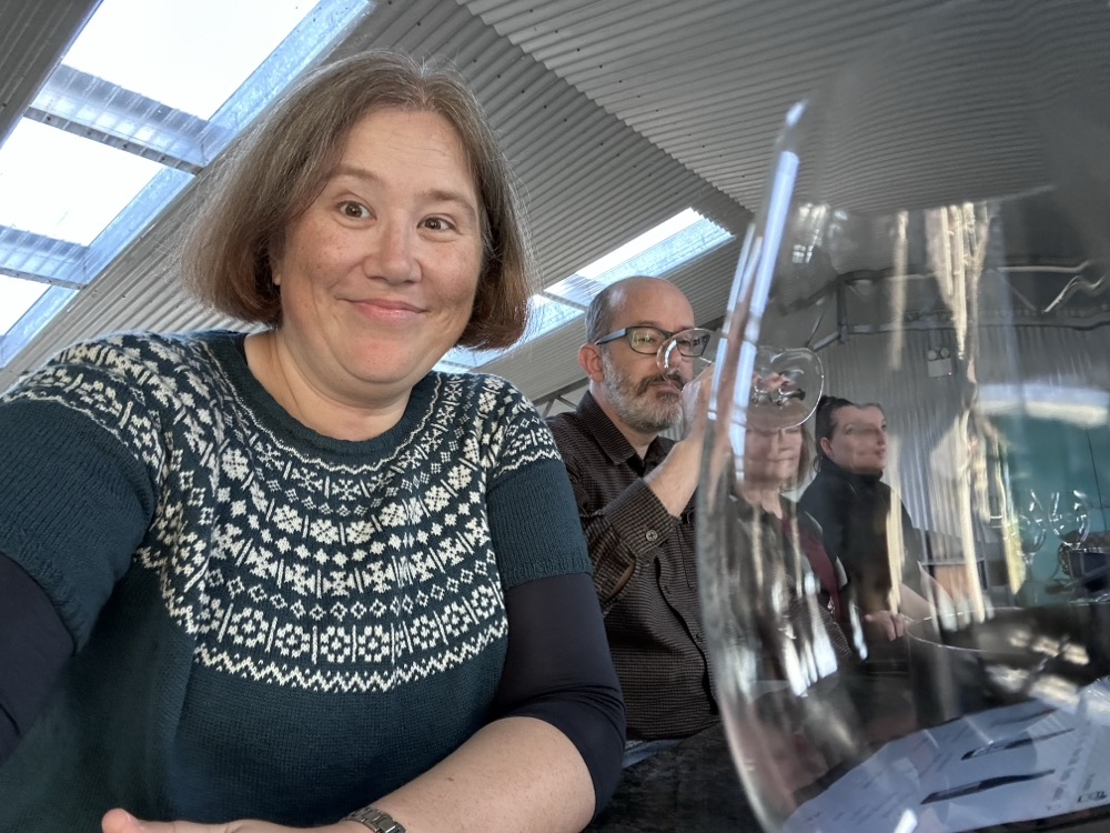 Two people at a wine tasting