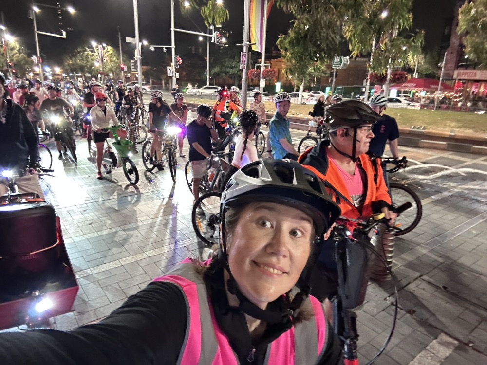A selfie of a rider in the middle of a big group ride
